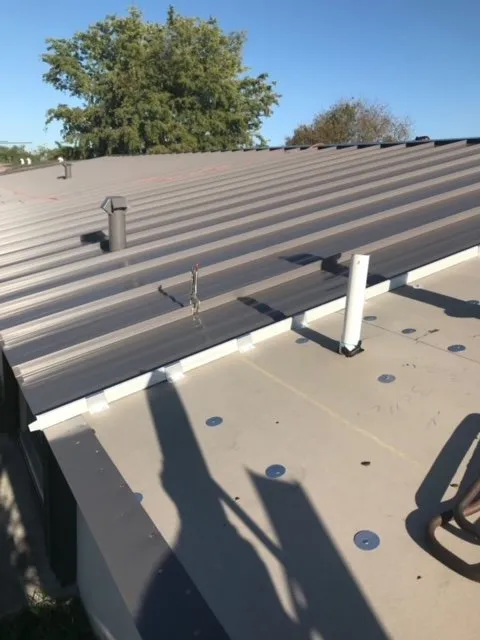 Slide of TNT Roofing