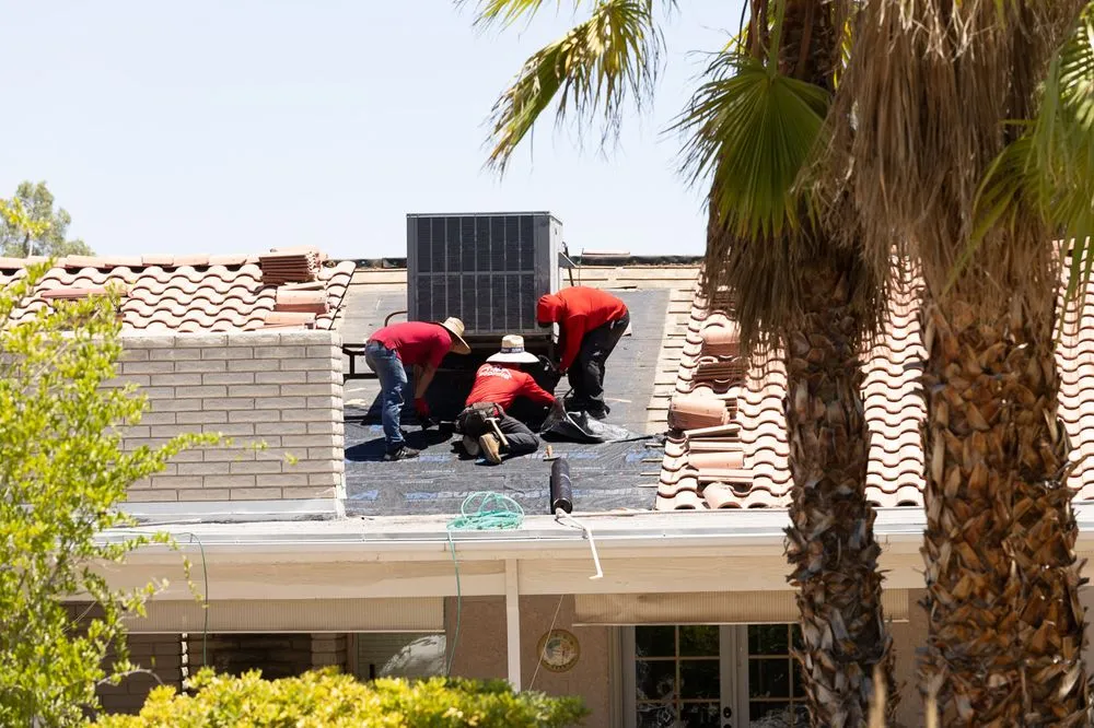 Slide of TNT Roofing