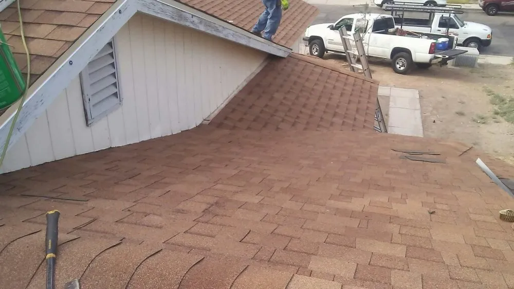 Slide of TNT Roofing