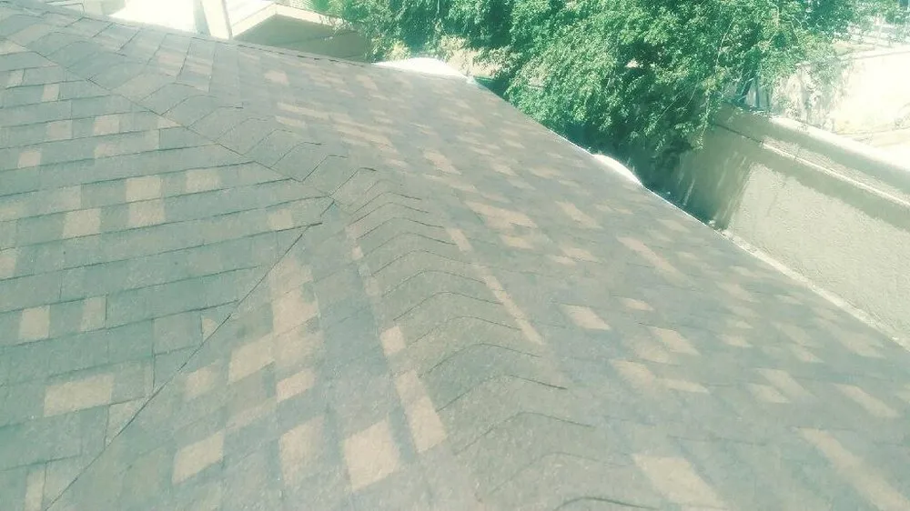 Slide of TNT Roofing