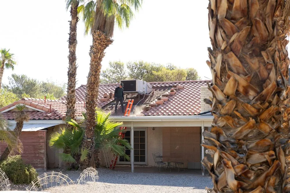 Slide of TNT Roofing