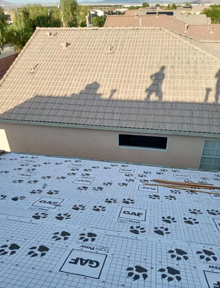 Slide of TNT Roofing