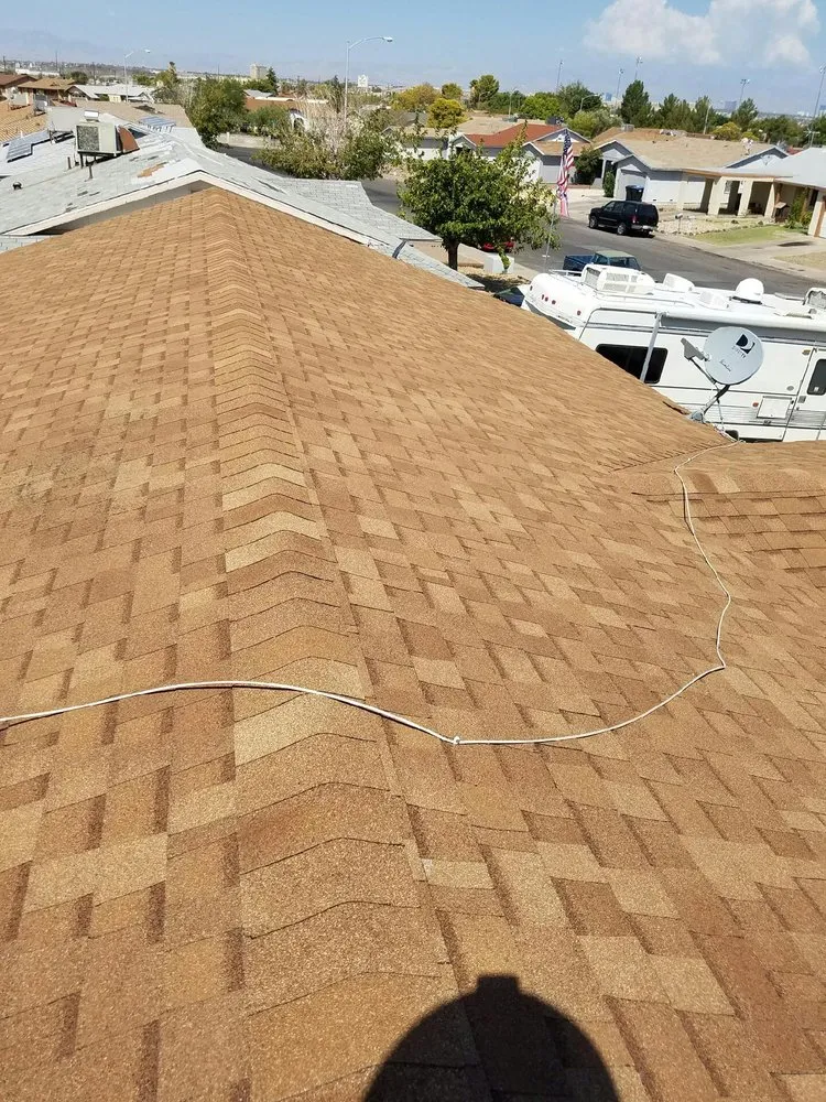 Slide of TNT Roofing