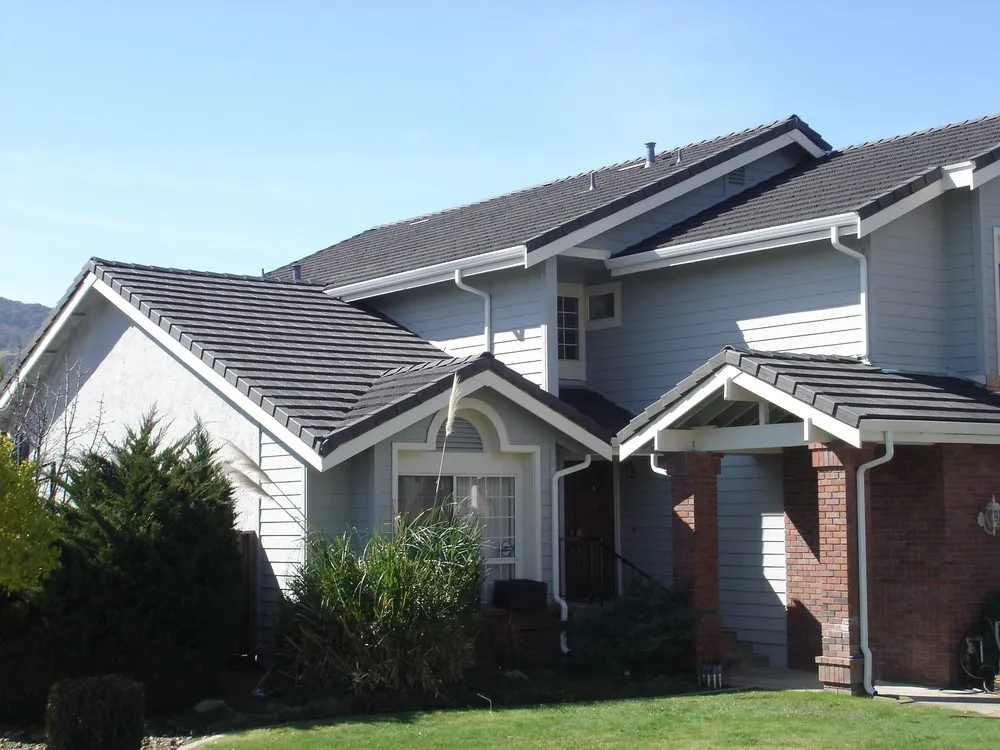 Slide of TNT Roofing