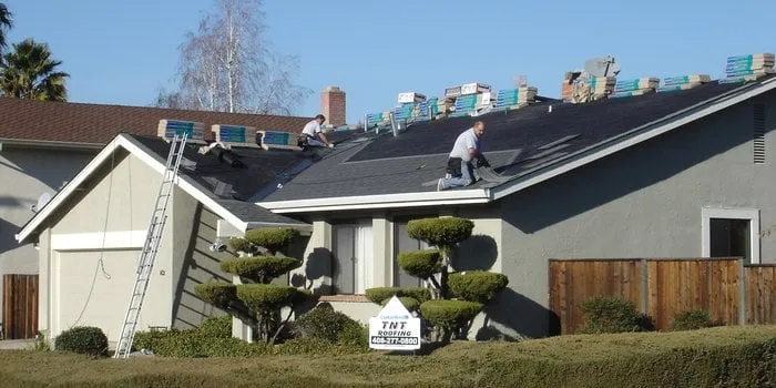 Slide of TNT Roofing