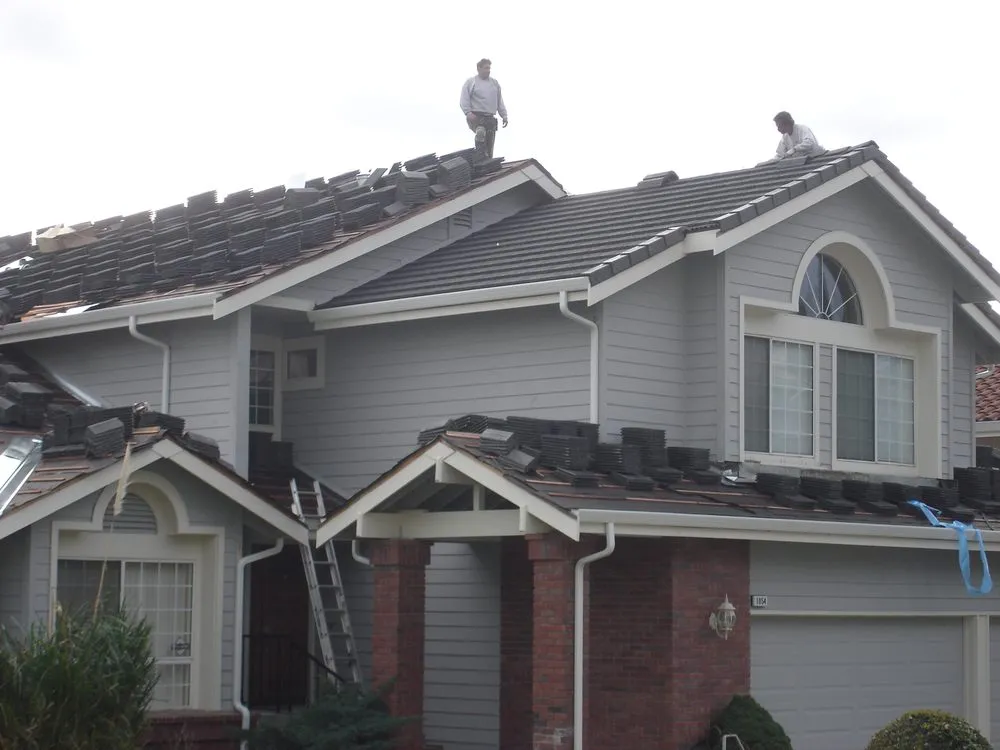 Slide of TNT Roofing