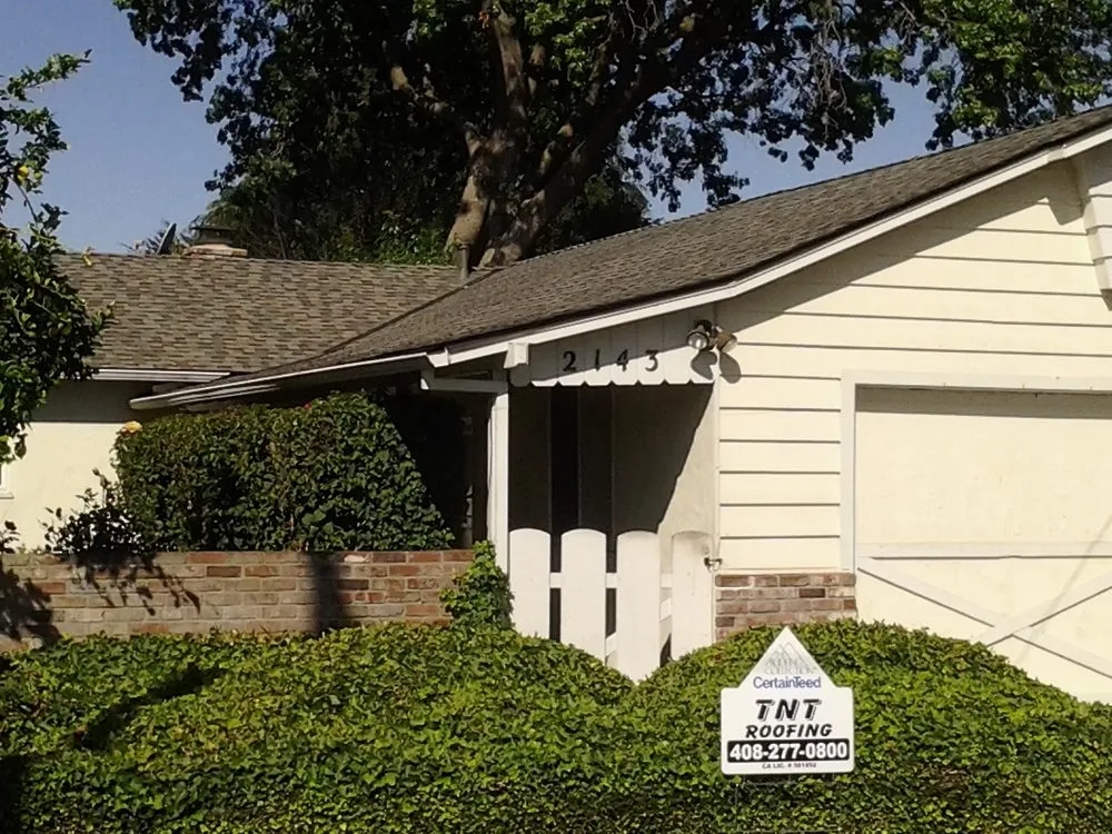 Slide of TNT Roofing