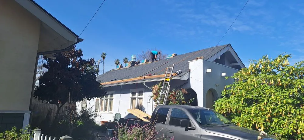 Slide of TNT Roofing