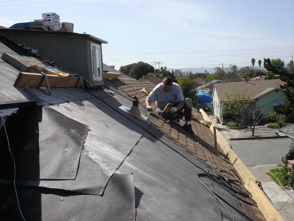 Slide of TNT Roofing