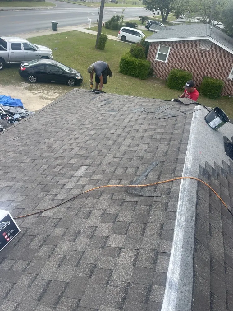 Slide of TNW Roofing