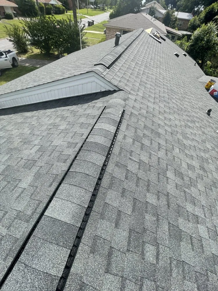 Slide of TNW Roofing