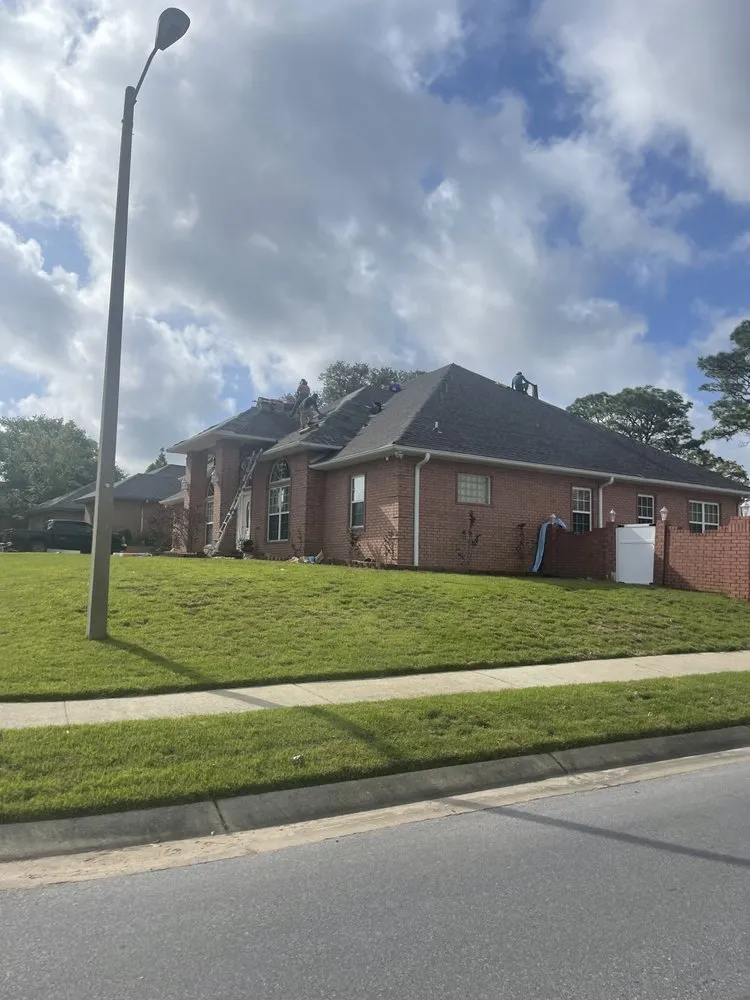 Slide of TNW Roofing