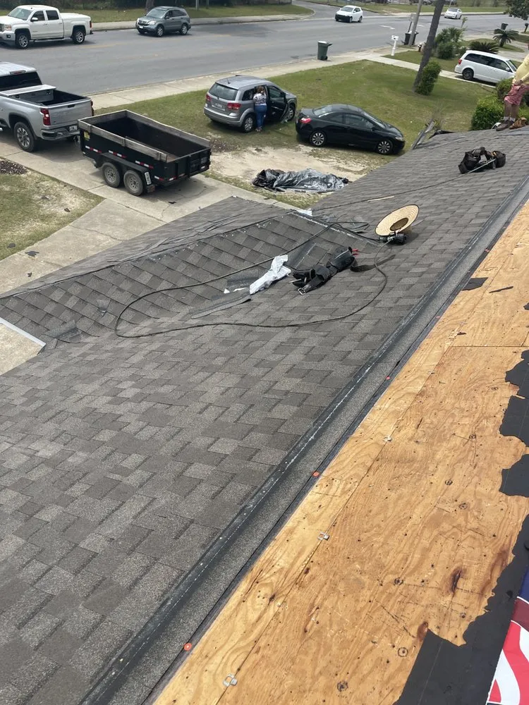 Slide of TNW Roofing