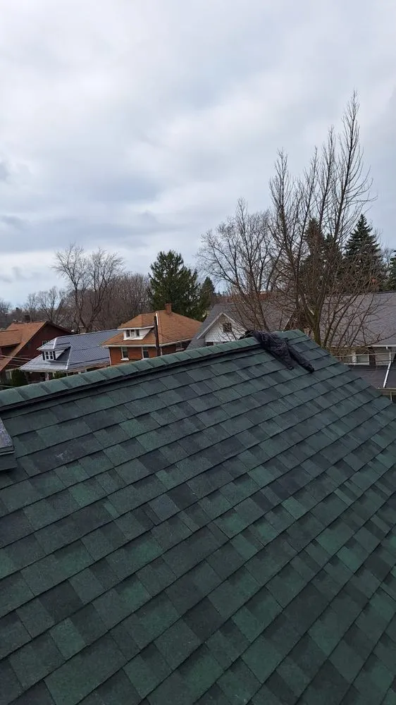 Slide of Tío Oli Roofing