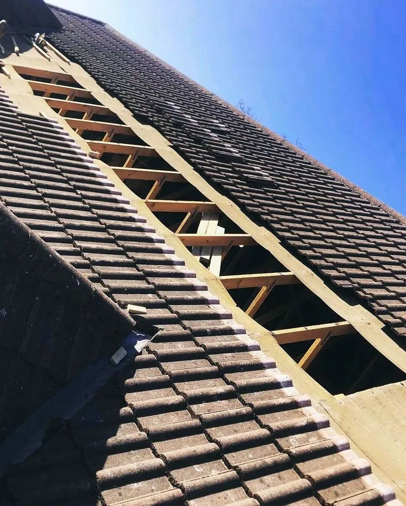 Slide of Tobin Hill Roofing