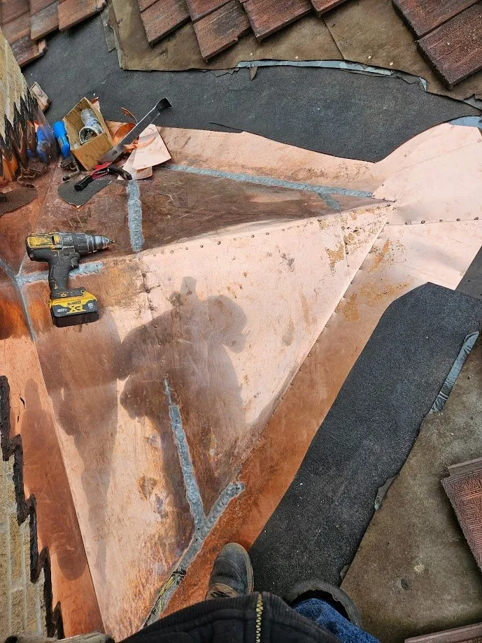 Slide of Todco Roofing