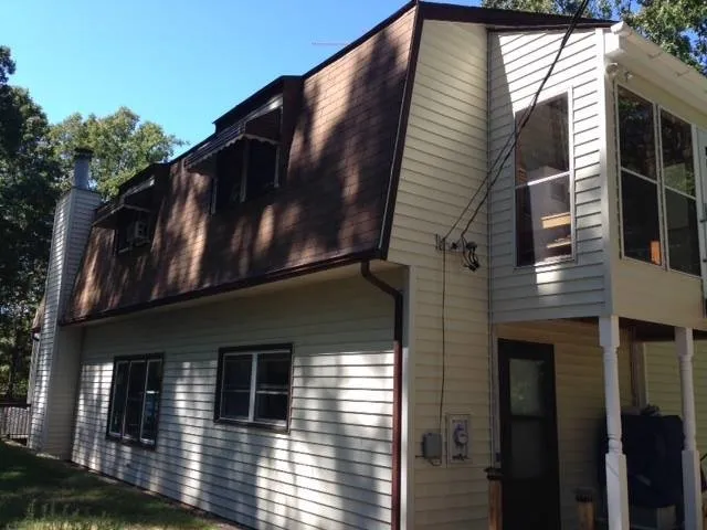 Slide of Todd Nelon Roofing