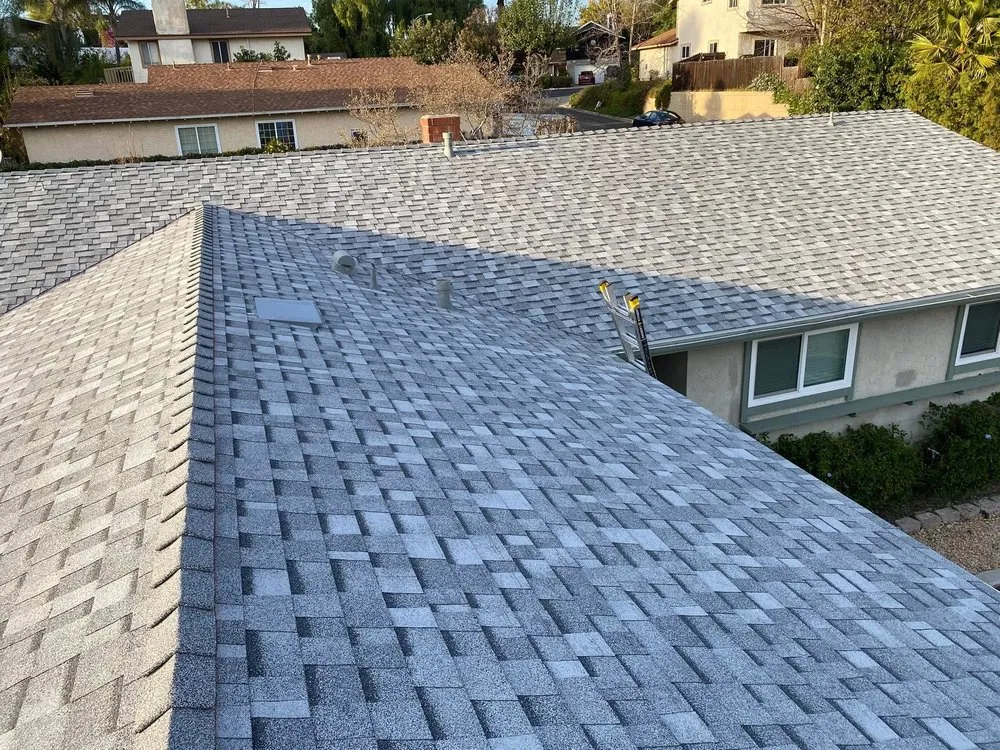 Slide of Tolenco Roofing