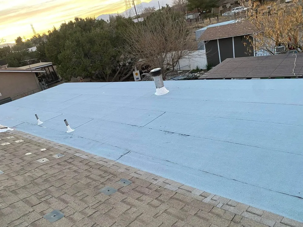 Slide of Tolenco Roofing