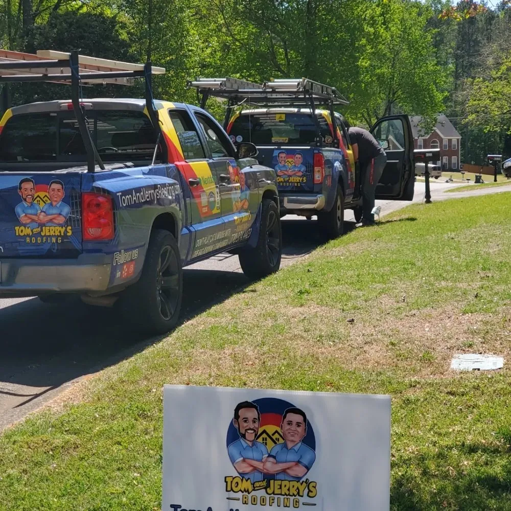 Slide of Tom and Jerry's Roofing
