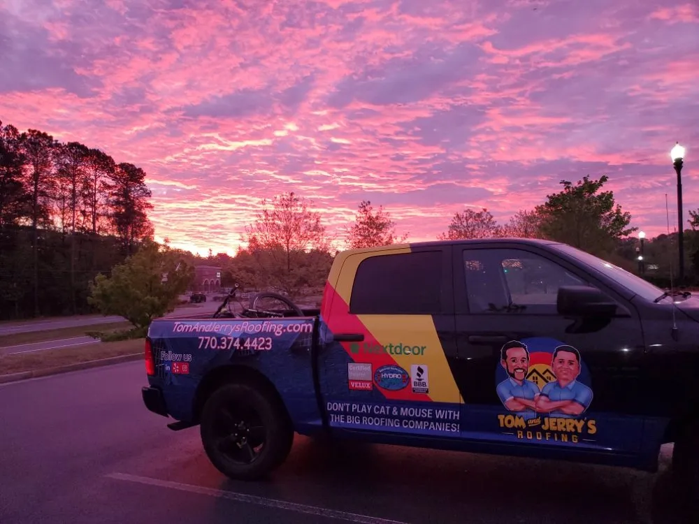 Slide of Tom and Jerry's Roofing