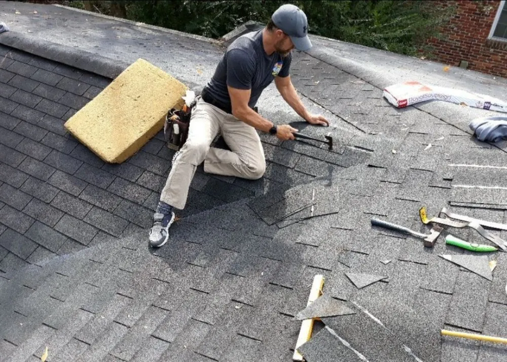 Slide of Tom and Jerry's Roofing