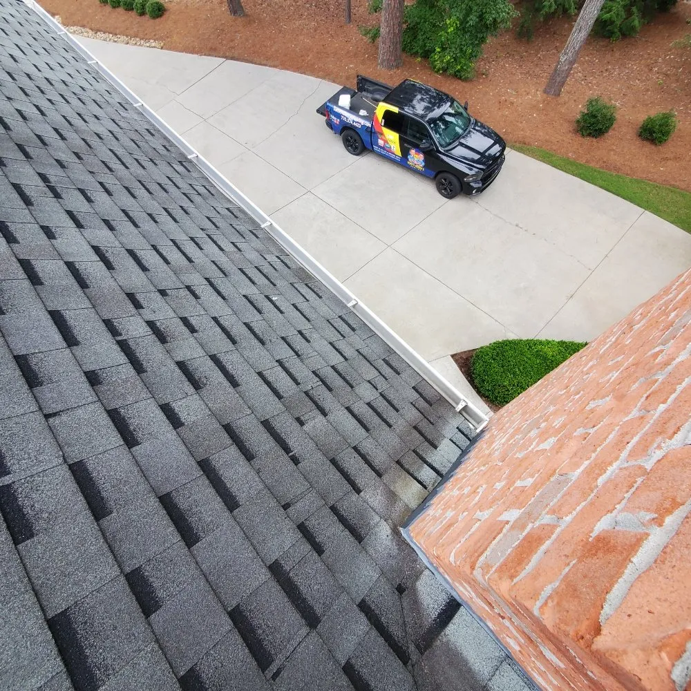 Slide of Tom and Jerry's Roofing