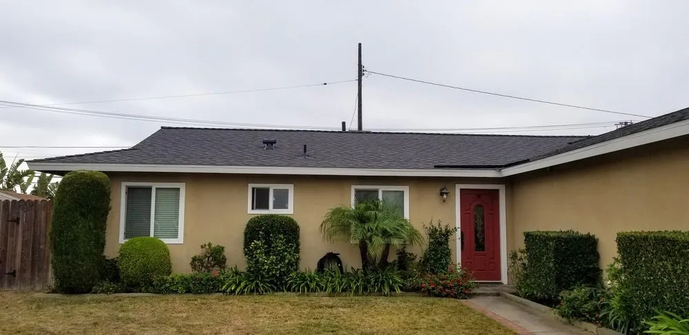 Slide of Tom Byer Roofing Service