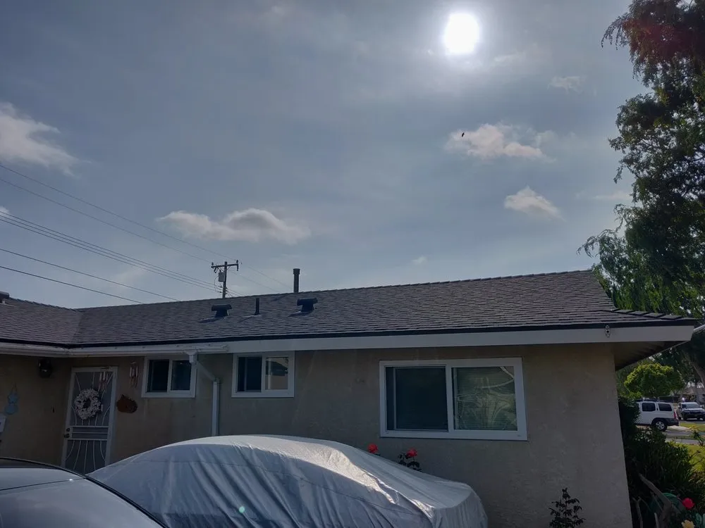 Slide of Tom Byer Roofing Service