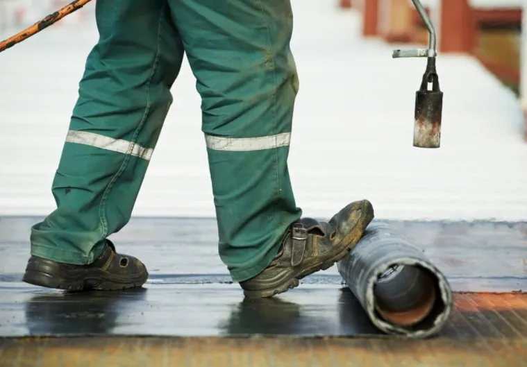 Slide of Tom Curry Roofing & Waterproofing