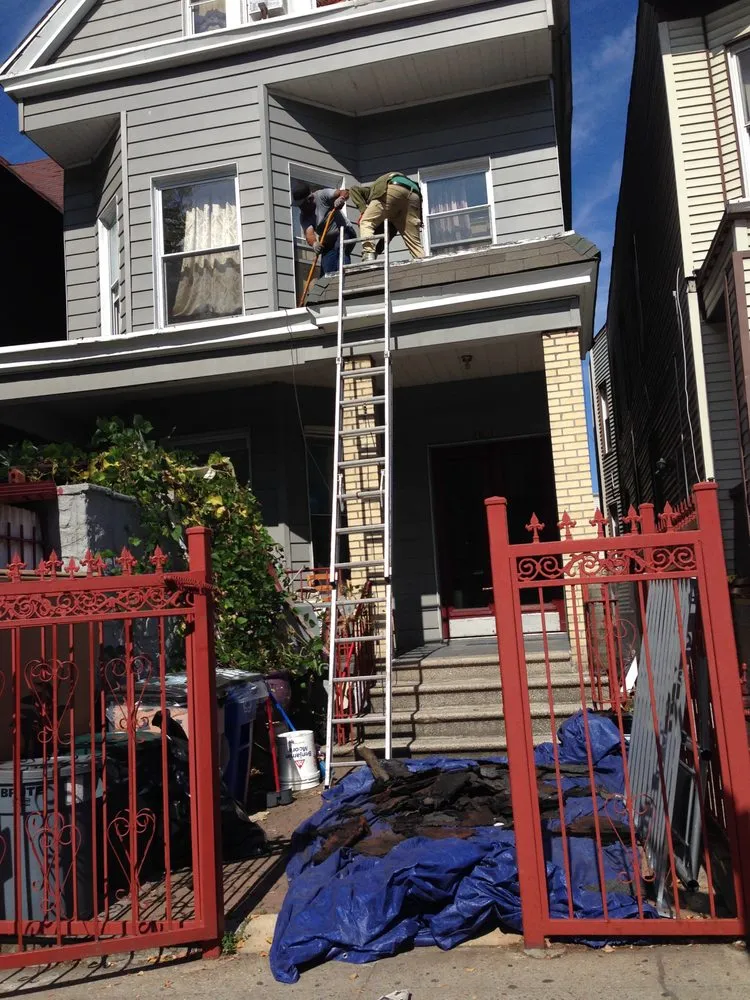 Slide of Tom Holden Roofing