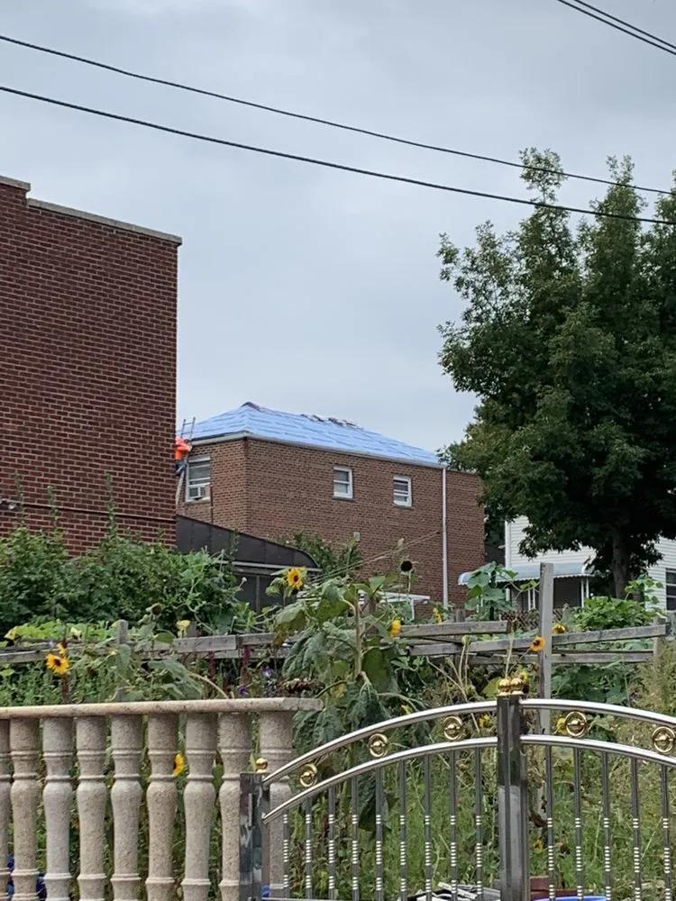 Slide of Tom Holden Roofing