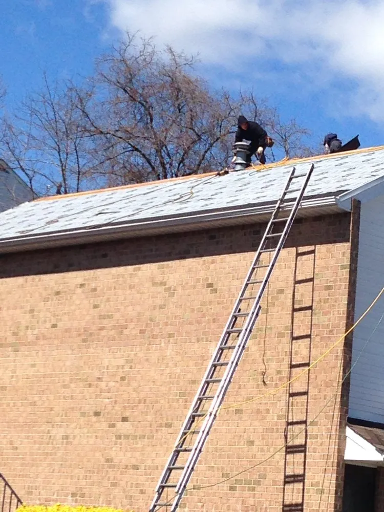 Slide of Tom Holden Roofing