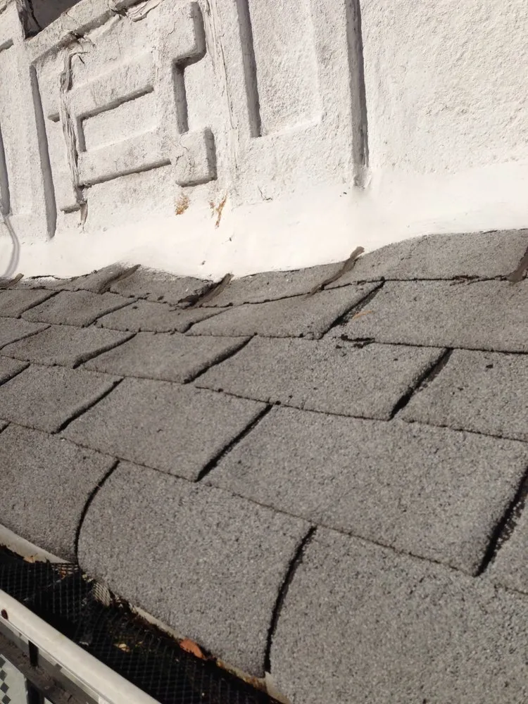 Slide of Tom Holden Roofing