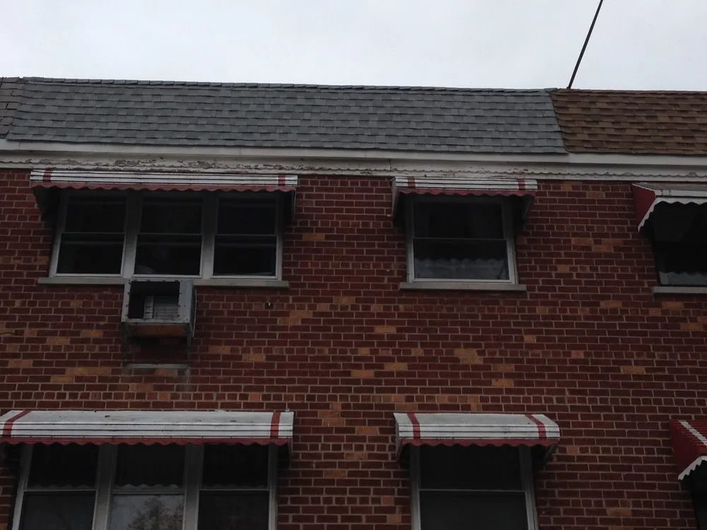 Slide of Tom Holden Roofing