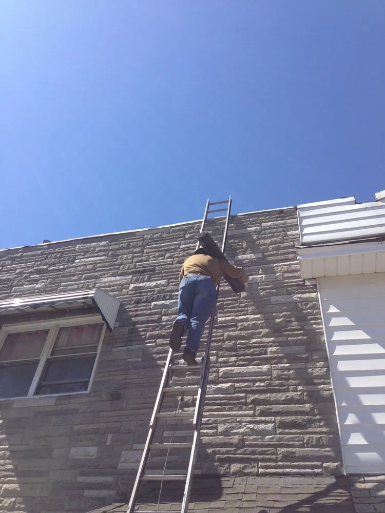 Slide of Tom Holden Roofing