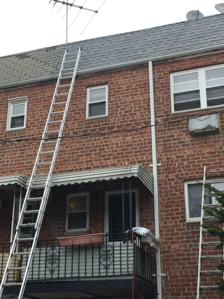 Slide of Tom Holden Roofing