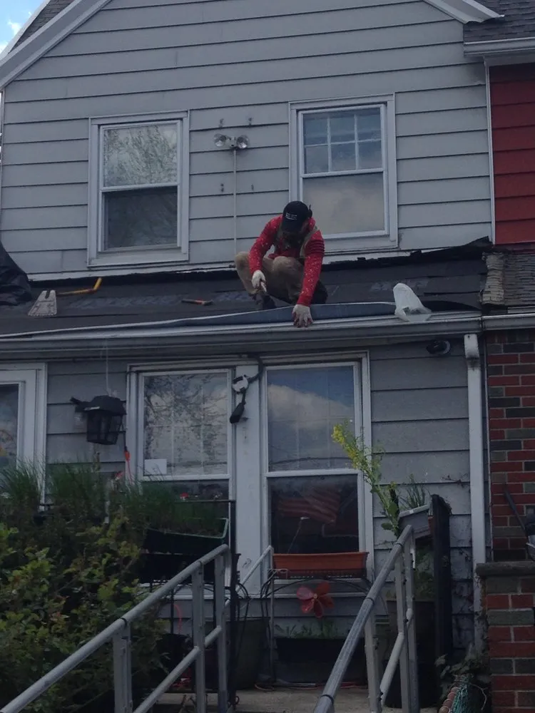 Slide of Tom Holden Roofing