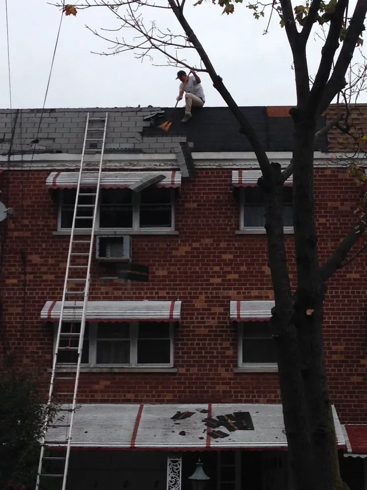 Slide of Tom Holden Roofing