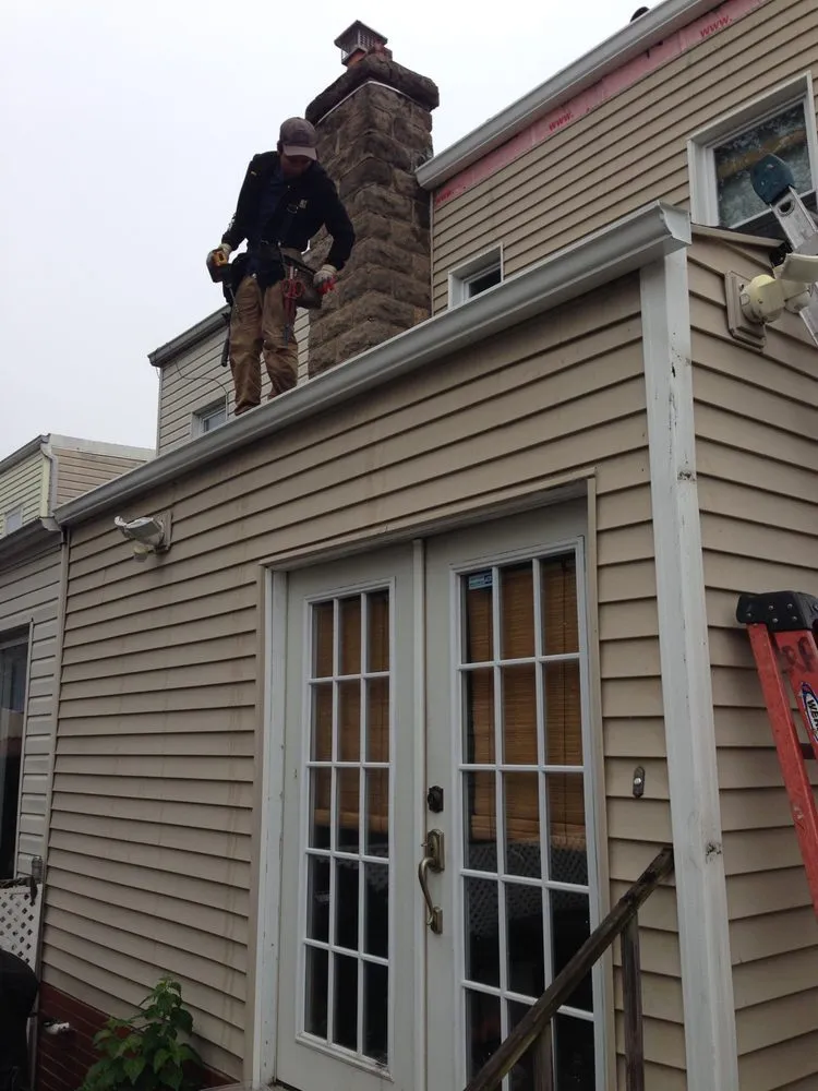 Slide of Tom Holden Roofing