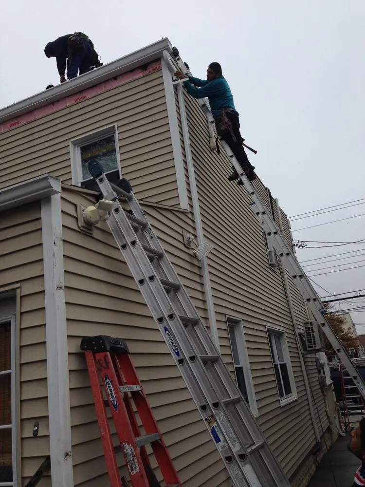 Slide of Tom Holden Roofing