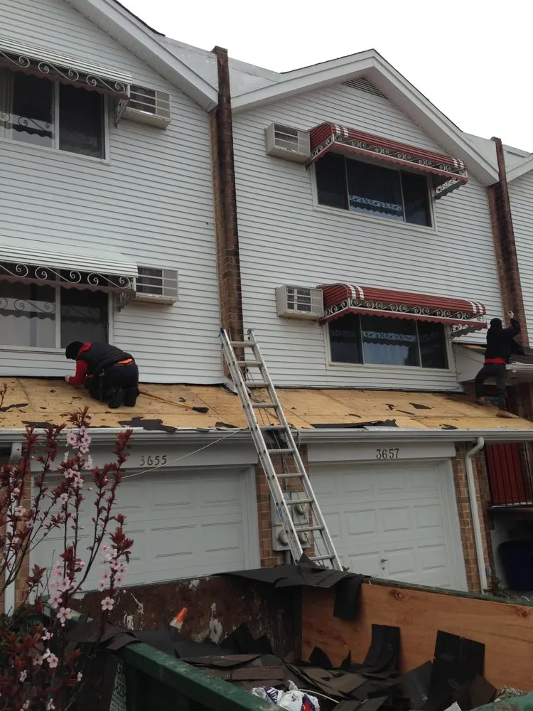 Slide of Tom Holden Roofing