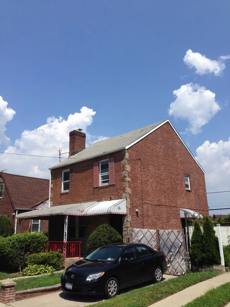 Slide of Tom Holden Roofing