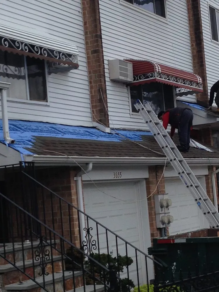 Slide of Tom Holden Roofing