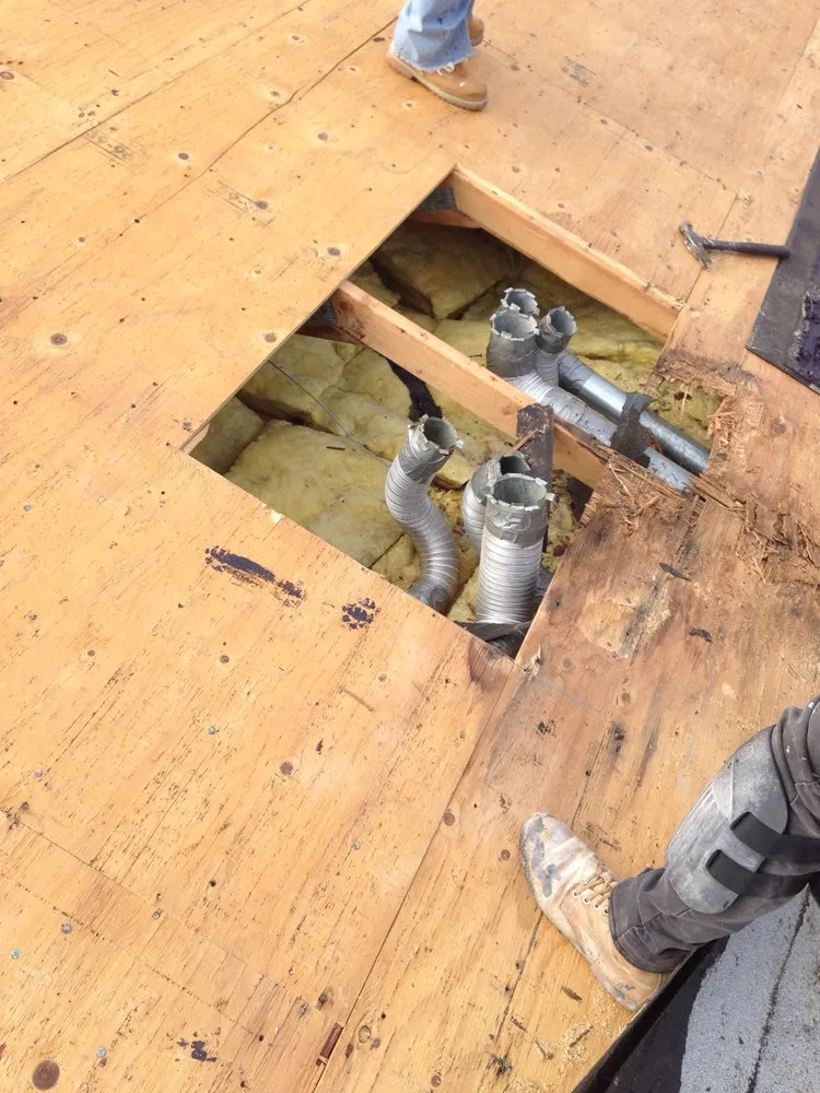 Slide of Tom Holden Roofing