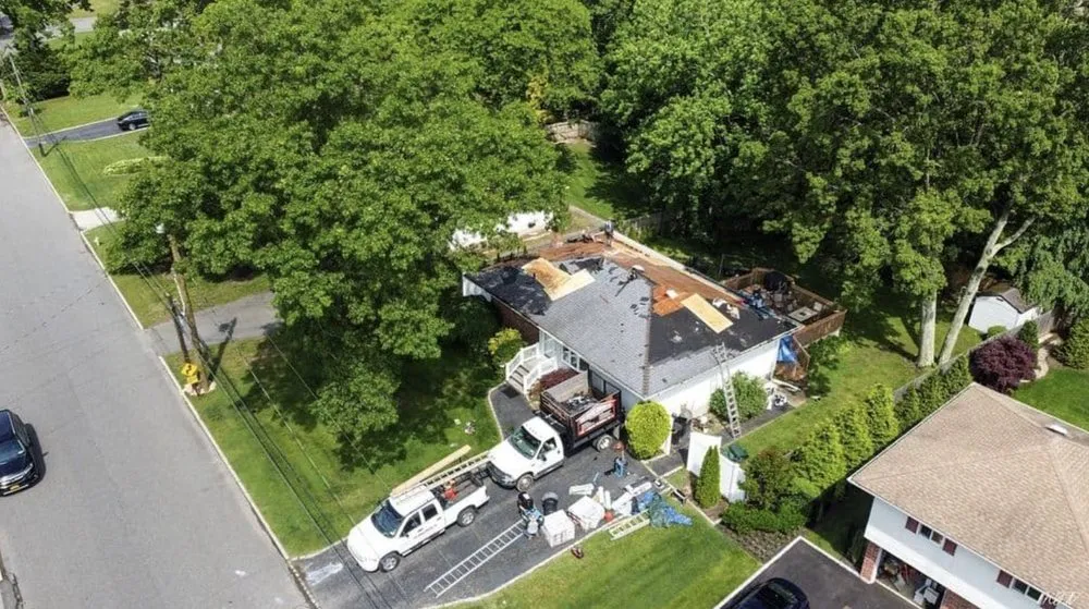 Slide of Tom Jannace Roofing