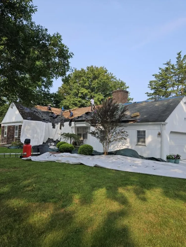 Slide of Tom Jannace Roofing