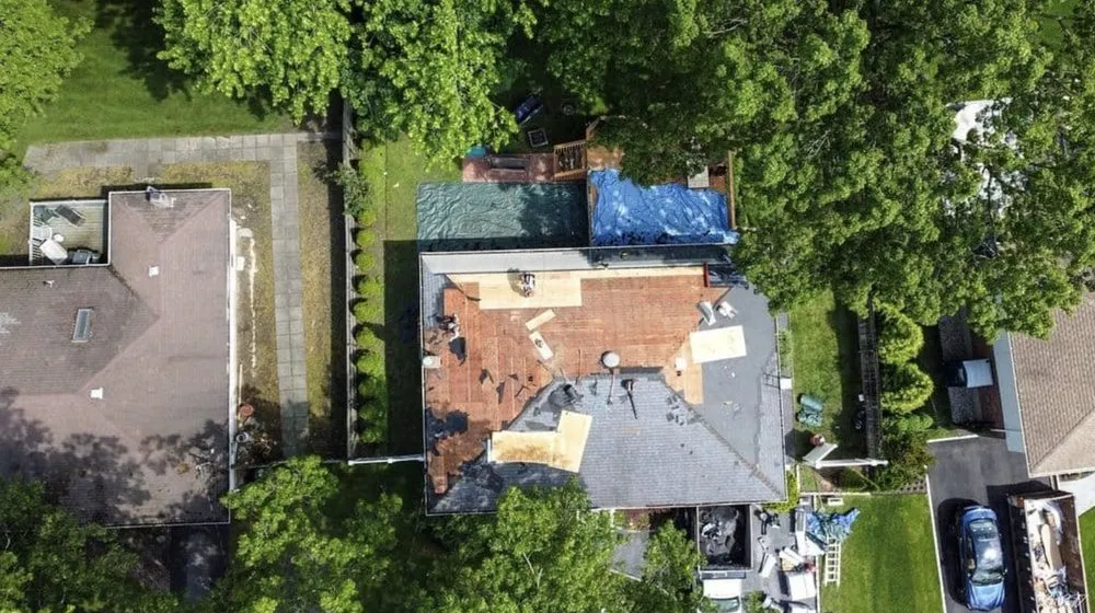 Slide of Tom Jannace Roofing