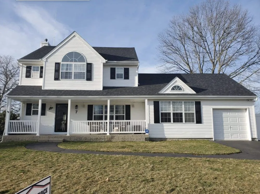 Slide of Tom Jannace Roofing