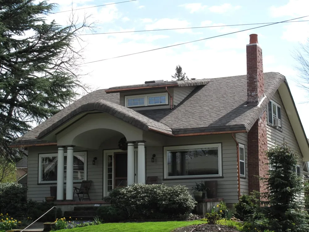 Slide of Tom Leach Roofing